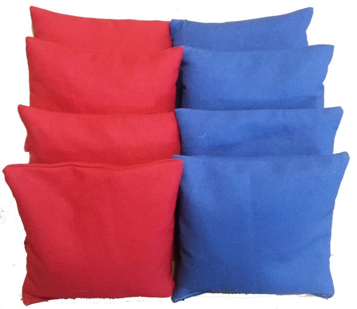 Set of eight solid color cornhole bags, four red and four blue